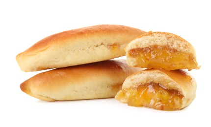 Photo of Tasty baked patties with orange jam isolated on white