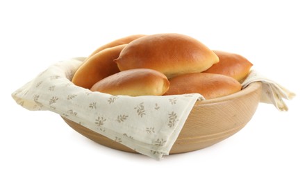 Photo of Tasty baked patties in wooden bowl isolated on white