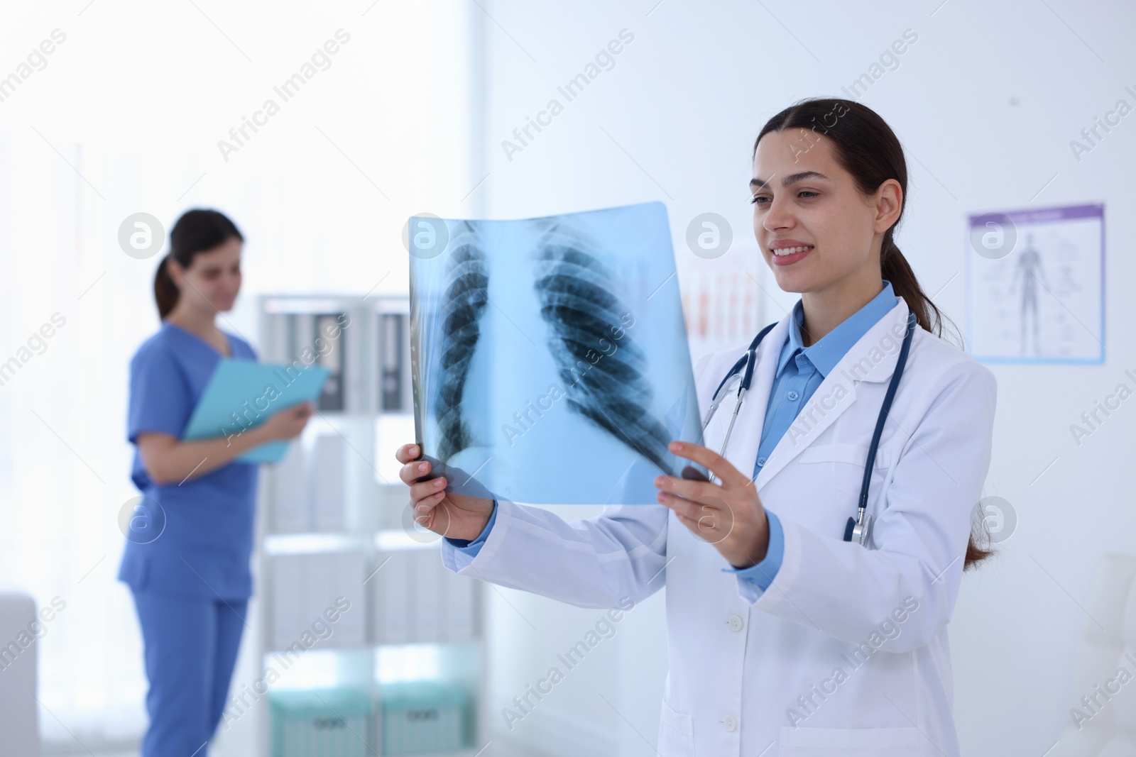 Doctor examining ribs MRI scan in hospital Photo of Doctor examining ribs MRI scan in hospital