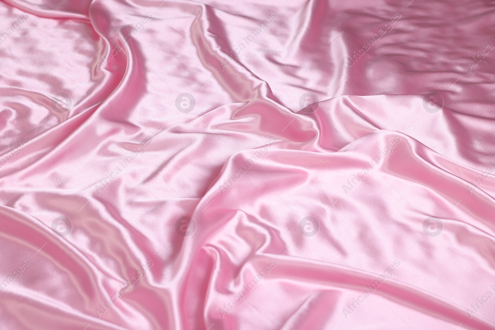 Luxury pink silk linens as background, closeup Photo of Luxury pink silk linens as background, closeup