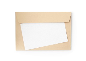 Photo of Blank greeting card and paper envelope on white background, top view