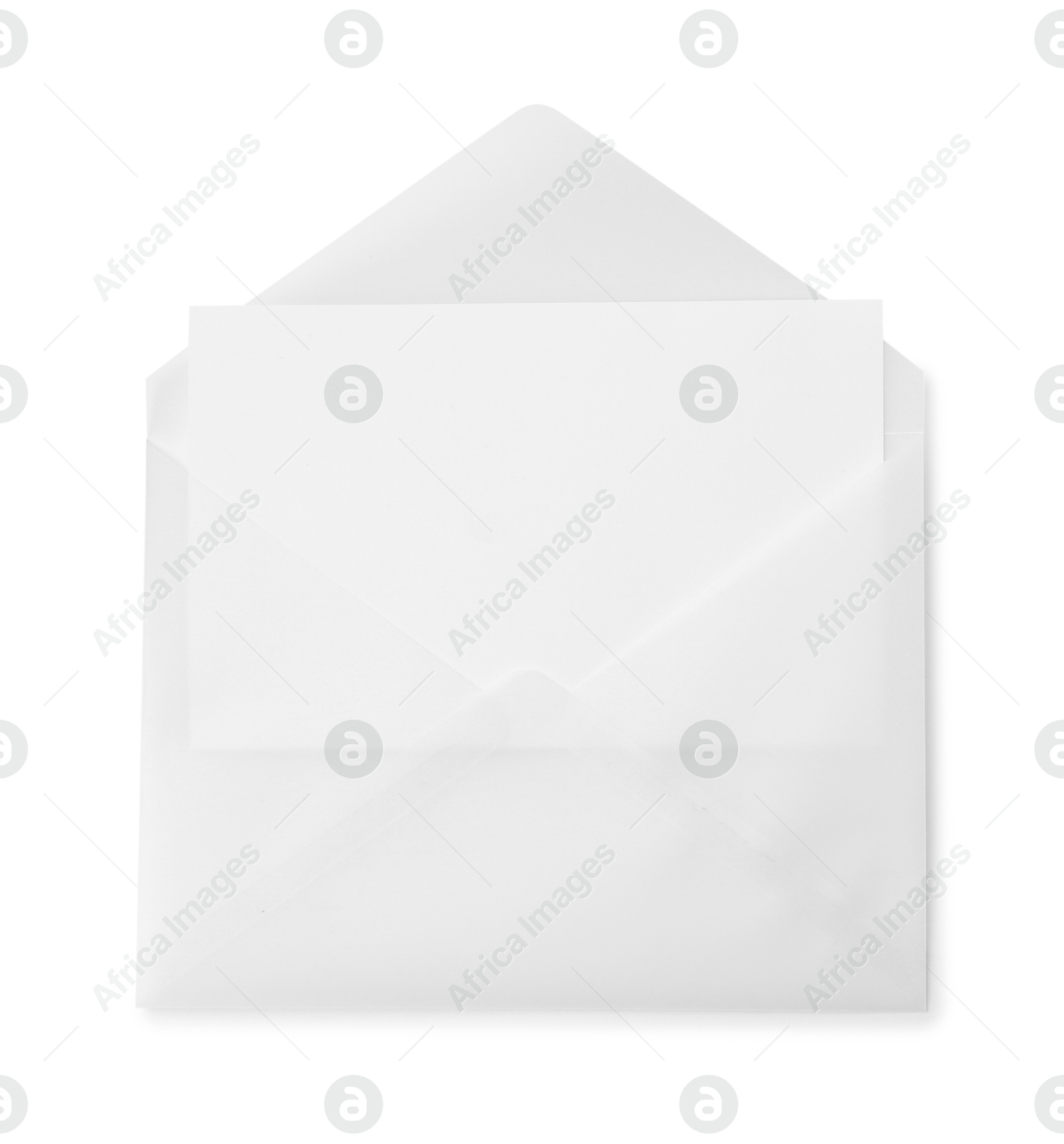 Photo of Blank greeting card in paper envelope on white background, top view