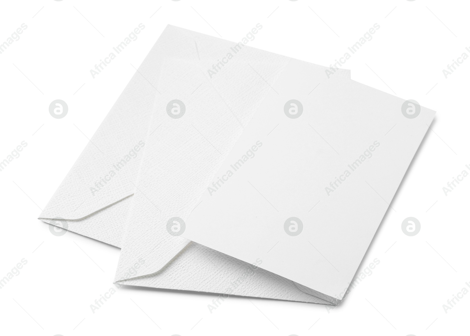 Photo of Blank greeting card and paper envelopes on white background