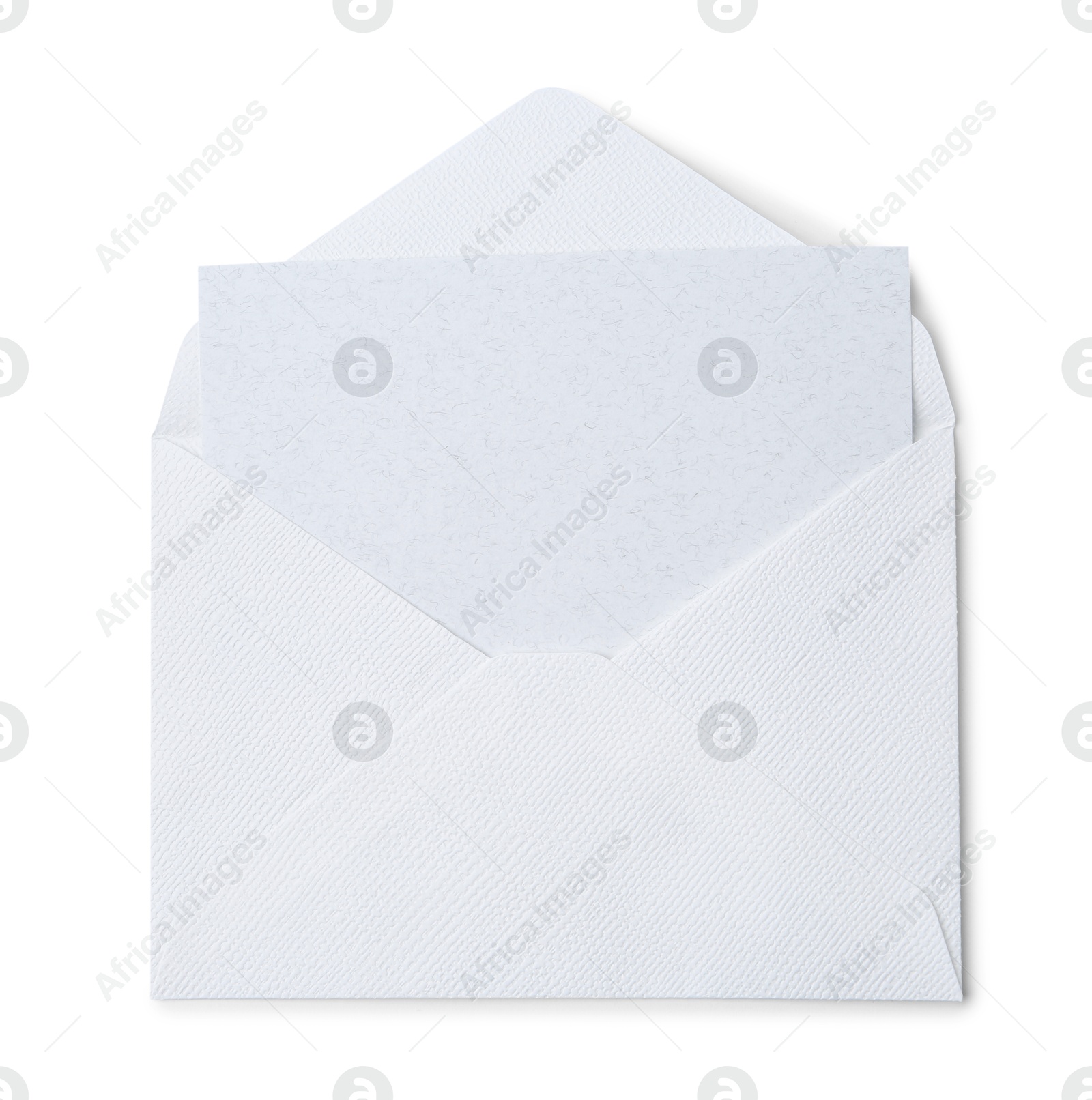 Photo of Blank greeting card in paper envelope on white background, top view