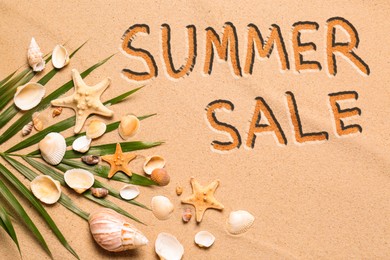 Image of Seasonal discount flyer. Words Summer Sale, shells, sea stars and palm leaf on sand, flat lay