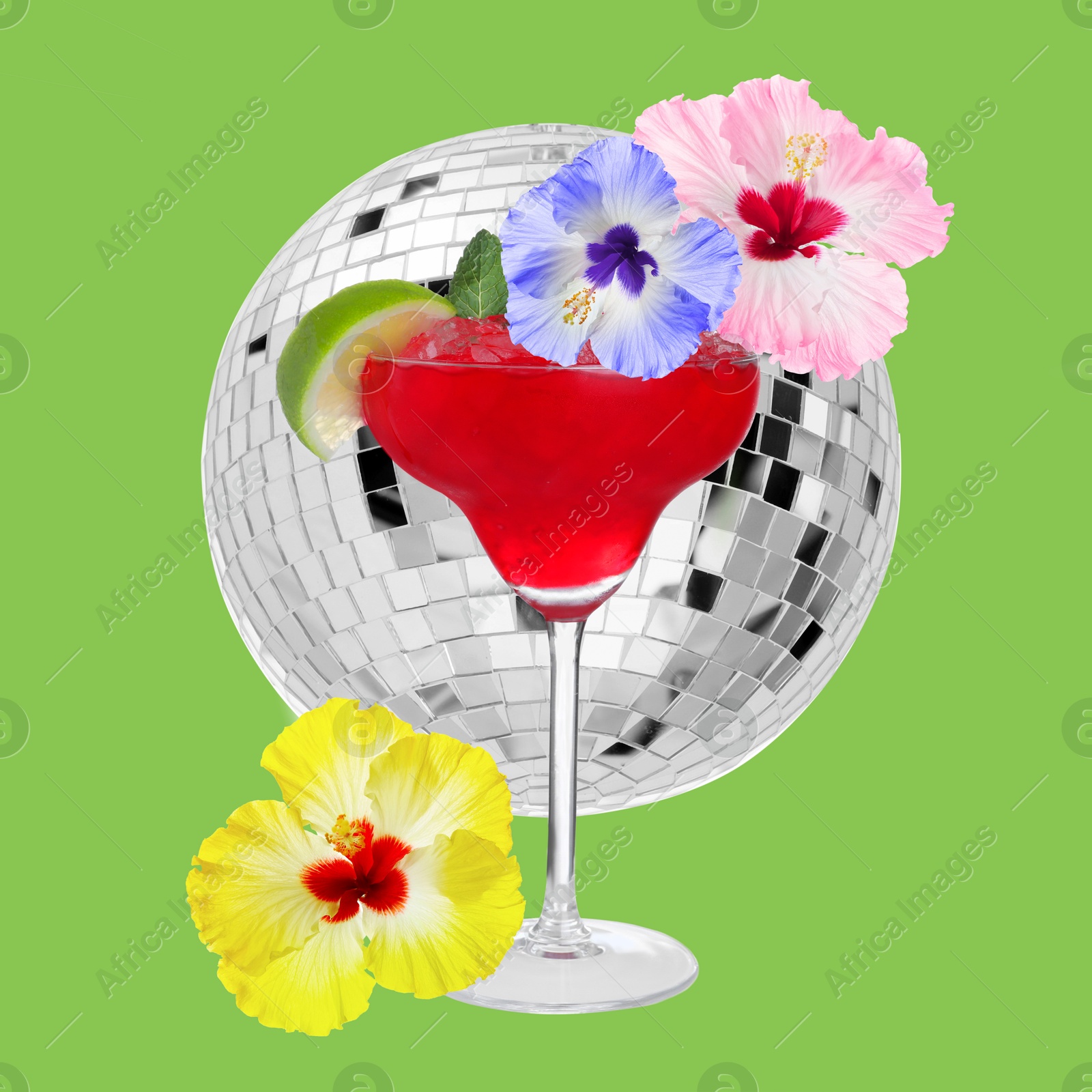 Summer party vibe. Refreshing cocktail with hibiscus flowers and disco ball on light green background. Stylish collage Image of Summer party vibe. Refreshing cocktail with hibiscus flowers and disco ball on light green background. Stylish collage