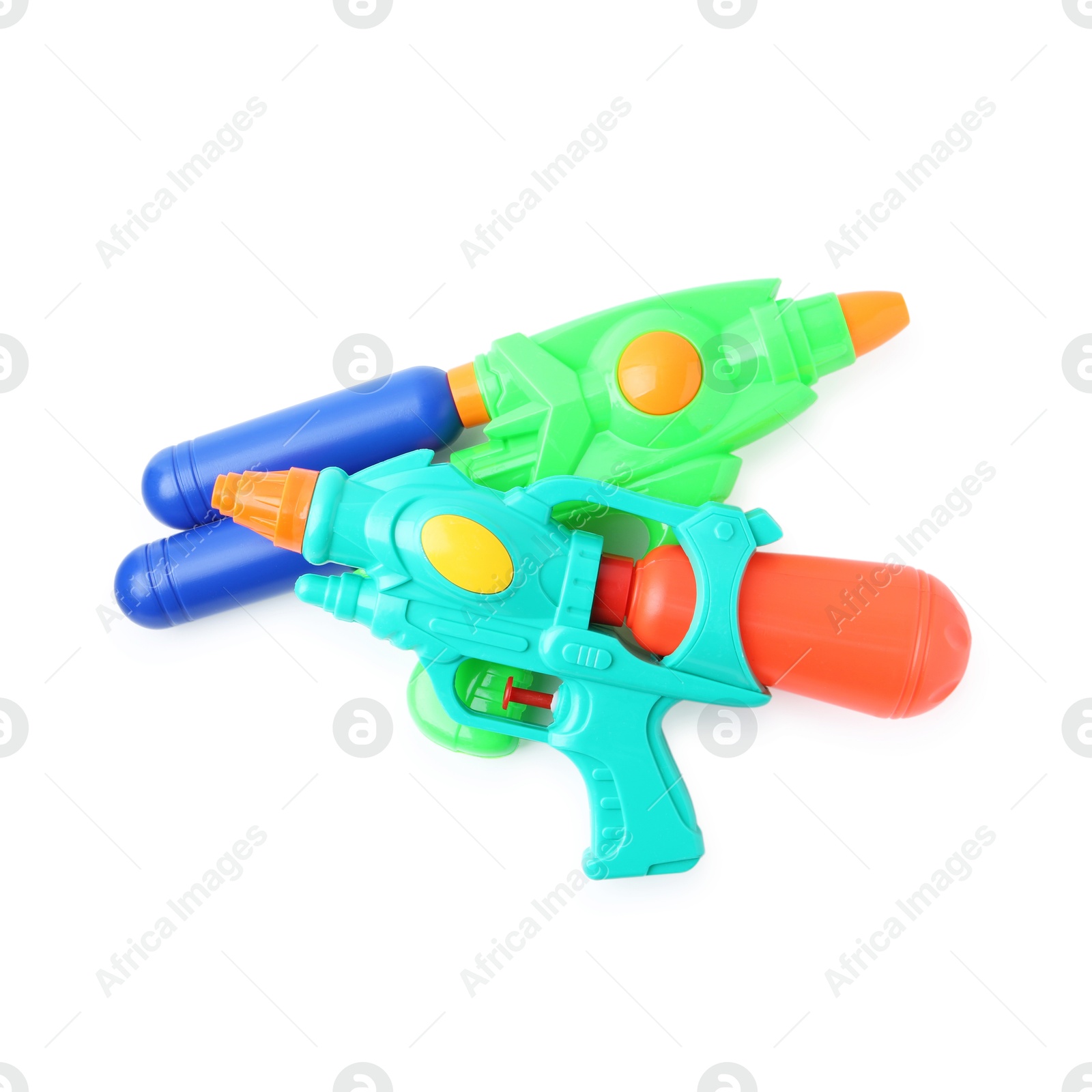Bright plastic water guns isolated on white, top view Photo of Bright plastic water guns isolated on white, top view