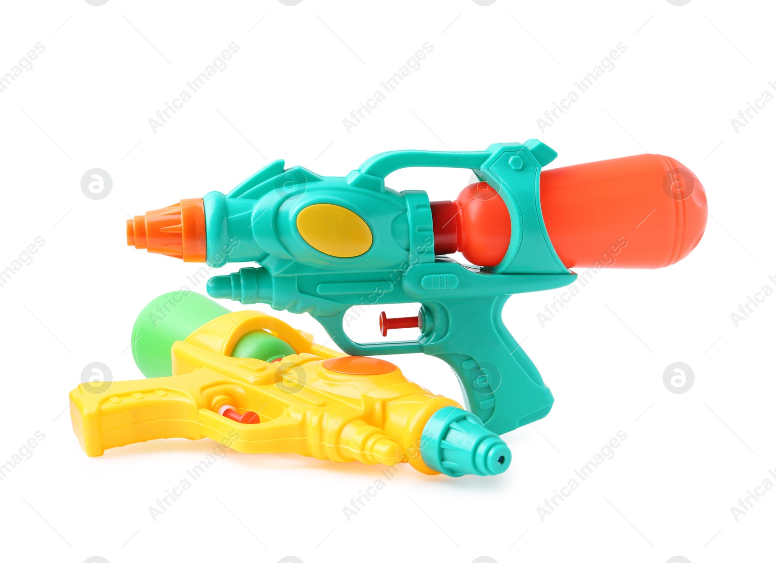 Bright plastic water guns isolated on white Photo of Bright plastic water guns isolated on white