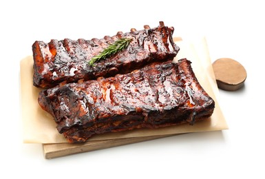 Photo of Tasty roasted pork ribs and rosemary isolated on white
