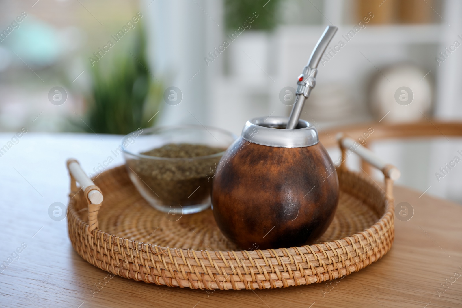 Traditional yerba mate tea on wooden table indoors, closeup Photo of Traditional yerba mate tea on wooden table indoors, closeup