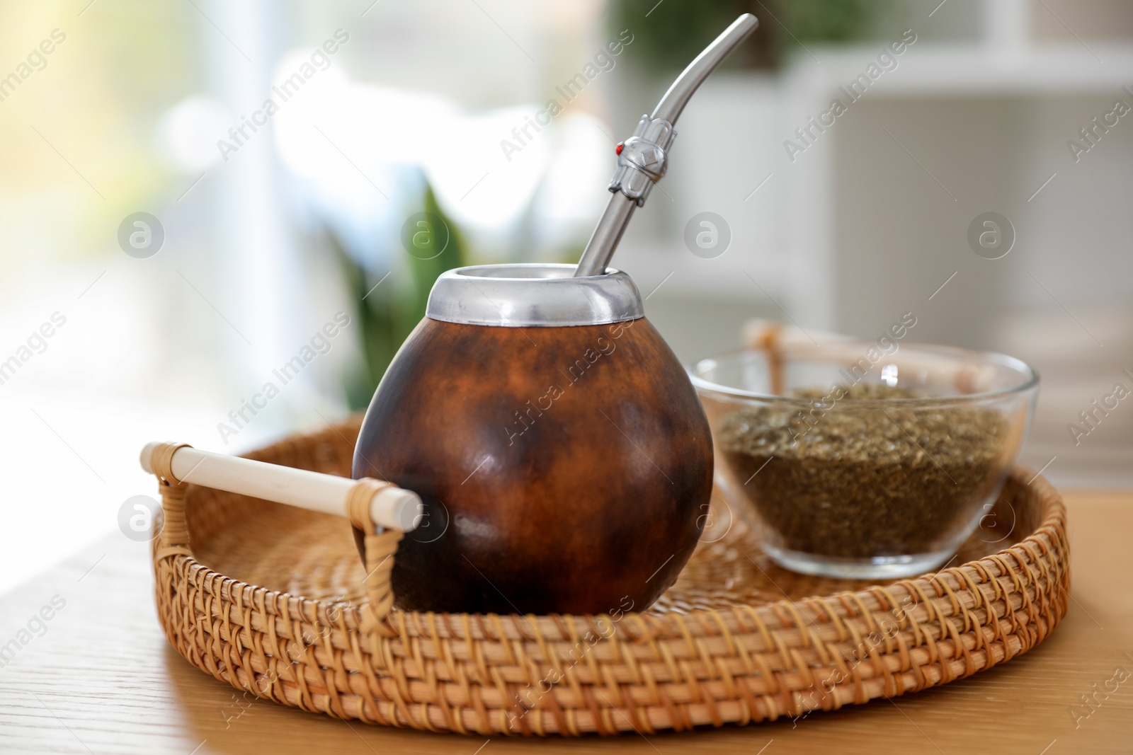 Traditional yerba mate tea on wooden table indoors, closeup Photo of Traditional yerba mate tea on wooden table indoors, closeup