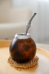 Photo of Traditional yerba mate tea on table indoors