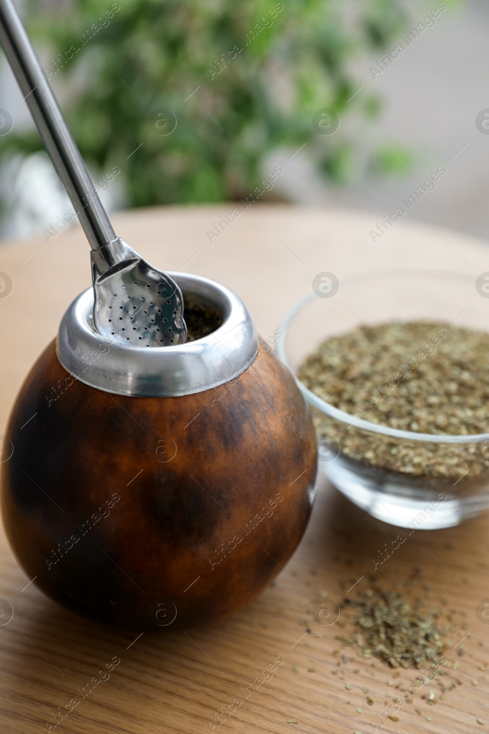 Traditional yerba mate tea on wooden table indoors, closeup Photo of Traditional yerba mate tea on wooden table indoors, closeup