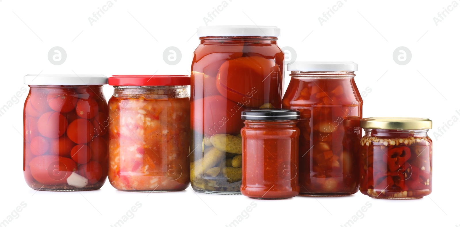 Many jars with different pickled products isolated on white Photo of Many jars with different pickled products isolated on white
