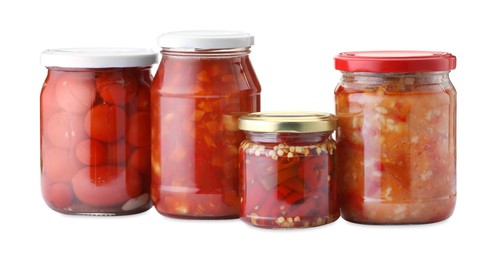 Photo of Many jars with different pickled products isolated on white