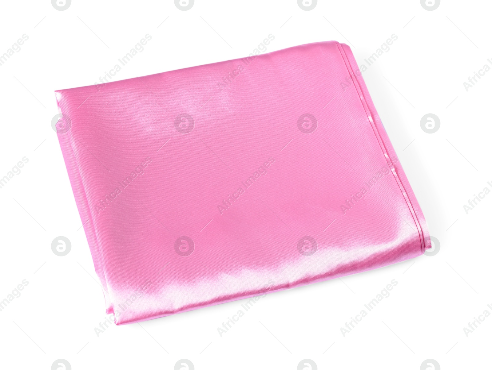 Silky pink bed linens on white background Photo of Silky pink bed linens on white background