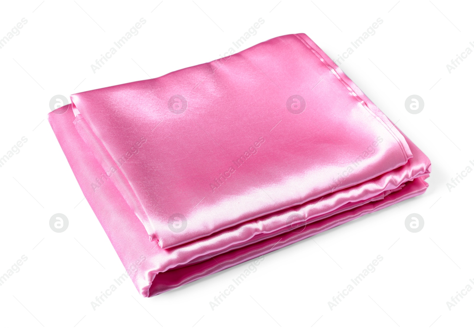 Silky pink bed linens on white background Photo of Silky pink bed linens on white background