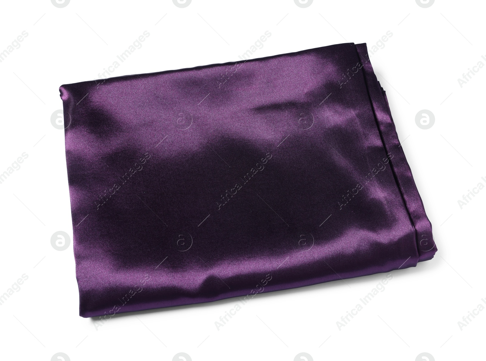 Silky purple bed linens on white background Photo of Silky purple bed linens on white background