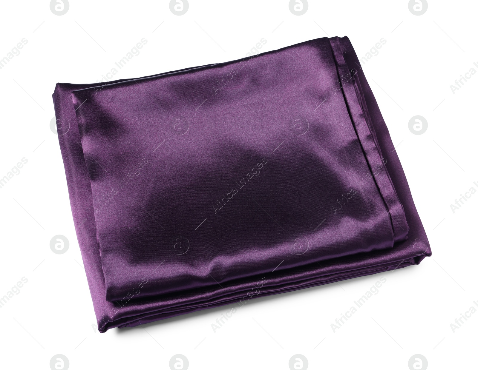 Silky purple bed linens on white background Photo of Silky purple bed linens on white background