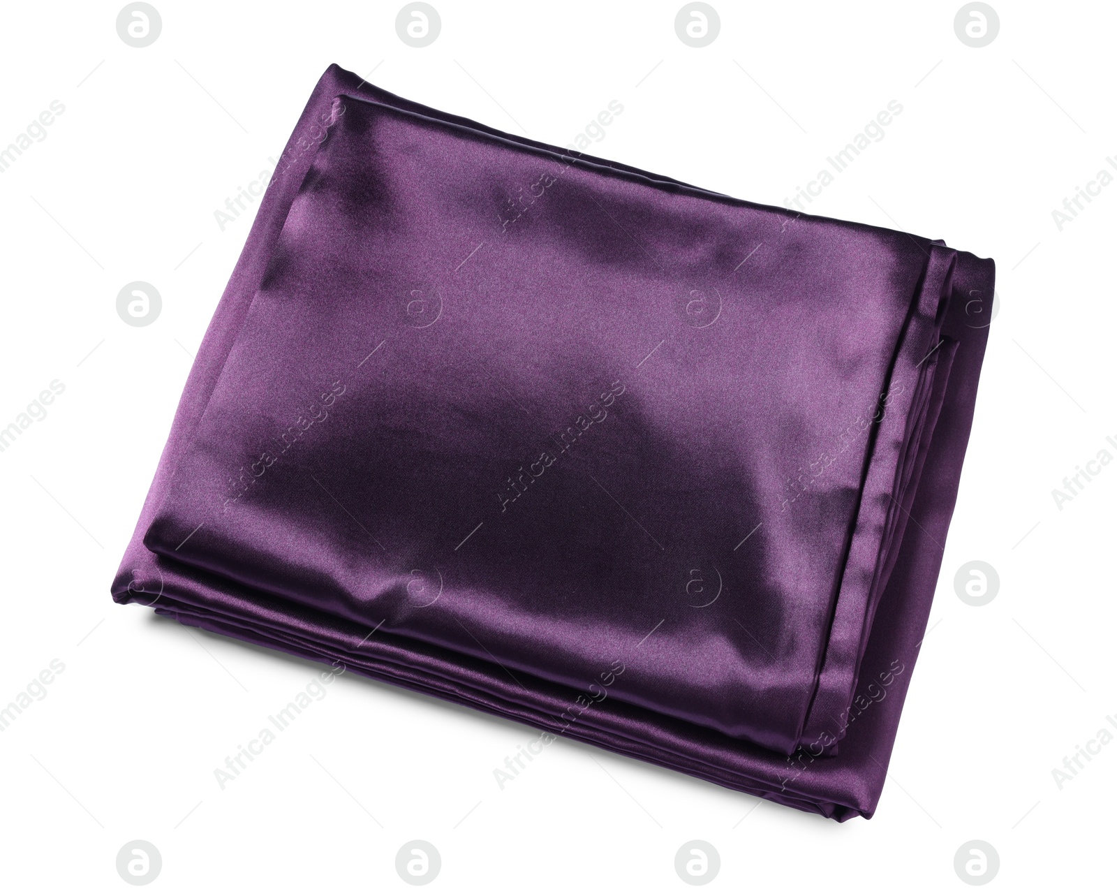 Silky purple bed linens on white background Photo of Silky purple bed linens on white background