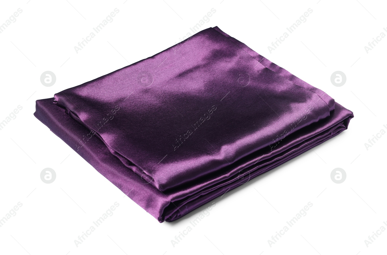 Silky purple bed linens on white background Photo of Silky purple bed linens on white background