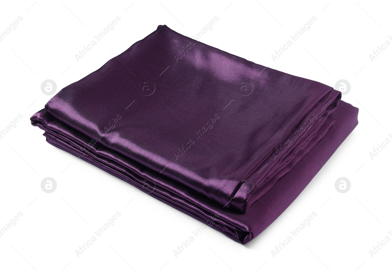 Silky purple bed linens on white background Photo of Silky purple bed linens on white background