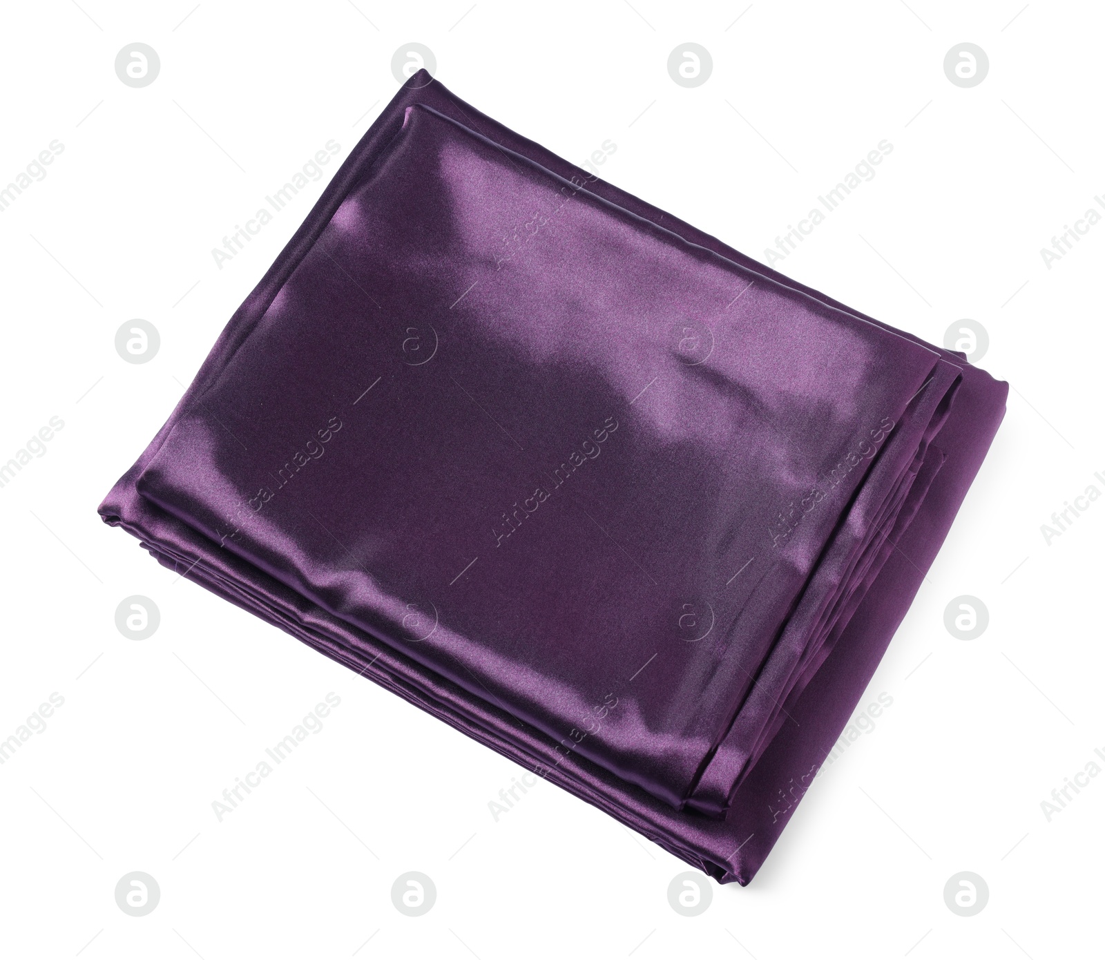Silky purple bed linens on white background Photo of Silky purple bed linens on white background