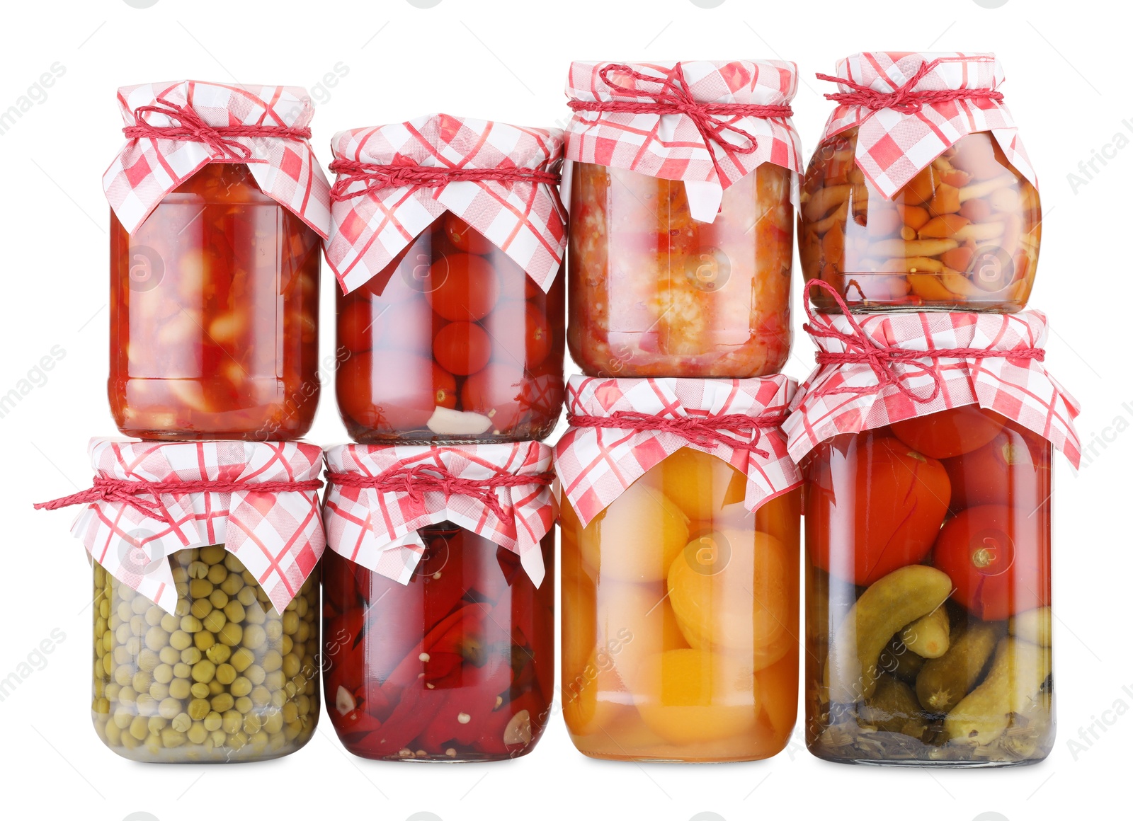 Many jars with different pickled products isolated on white Photo of Many jars with different pickled products isolated on white