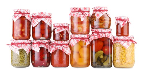 Photo of Many jars with different pickled products isolated on white