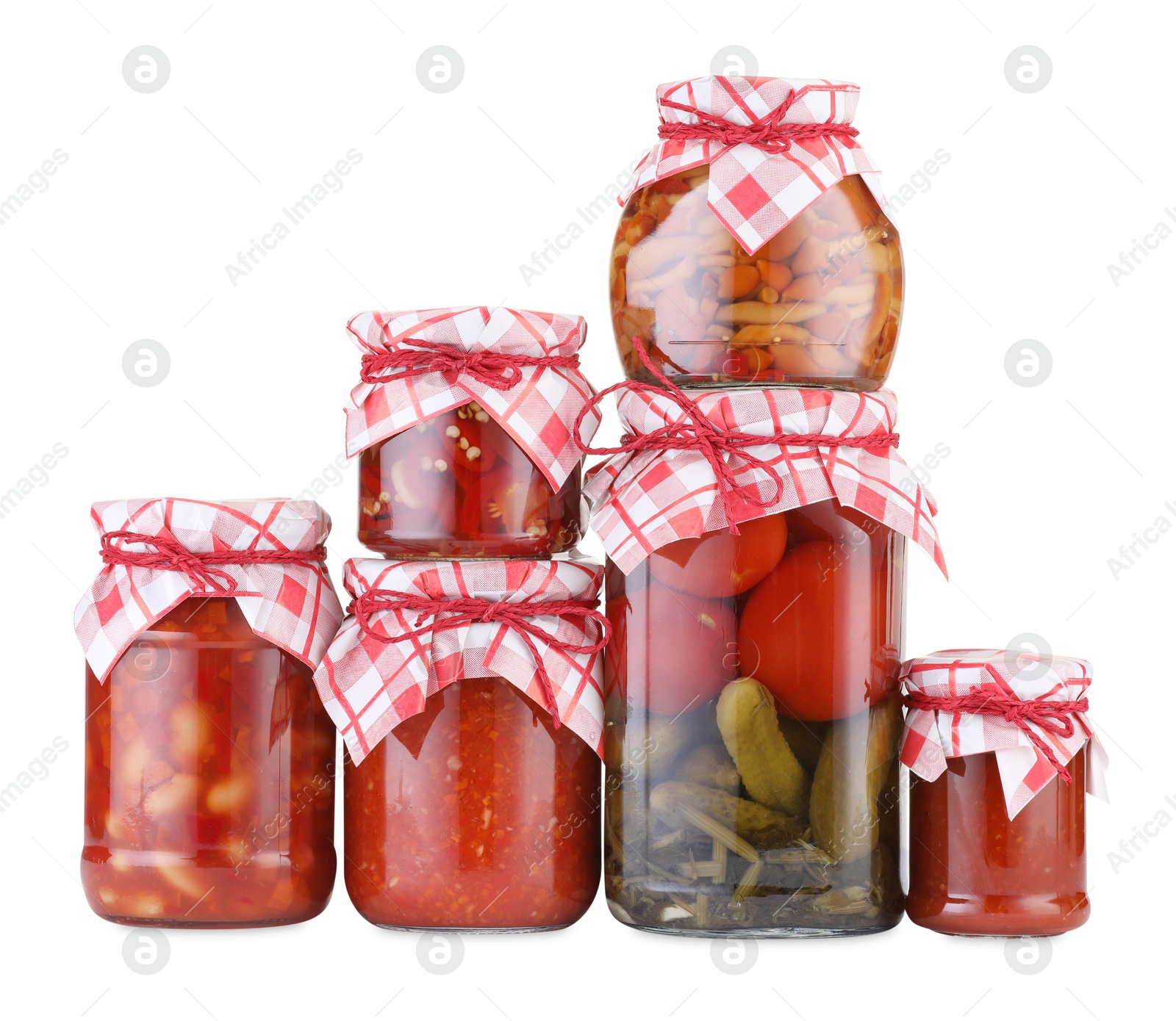 Many jars with different pickled products isolated on white Photo of Many jars with different pickled products isolated on white