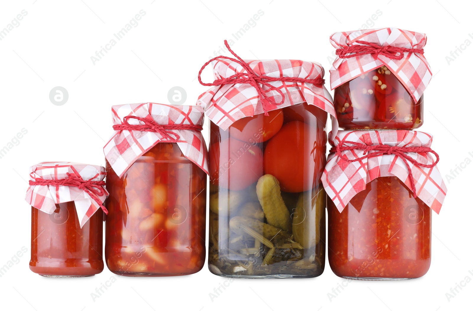 Many jars with different pickled products isolated on white Photo of Many jars with different pickled products isolated on white