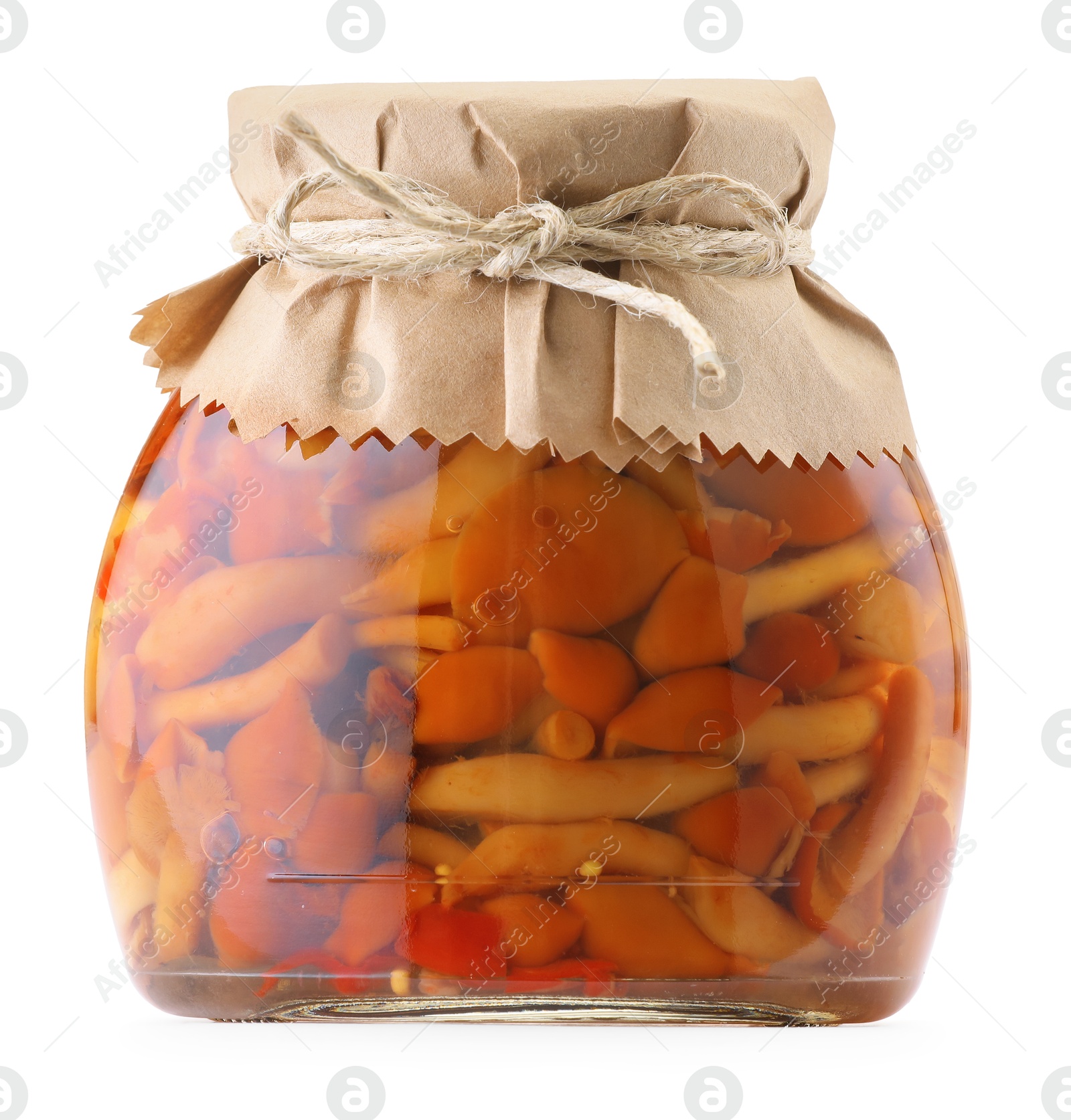 Tasty pickled mushrooms in jar isolated on white Photo of Tasty pickled mushrooms in jar isolated on white