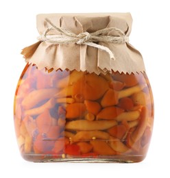 Photo of Tasty pickled mushrooms in jar isolated on white