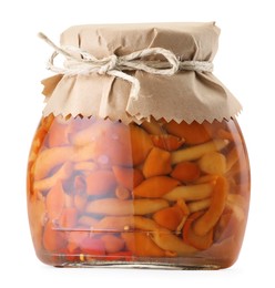 Photo of Tasty pickled mushrooms in jar isolated on white