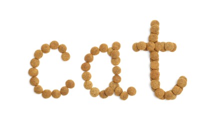 Photo of Word Cat made of dry pet food isolated on white, top view