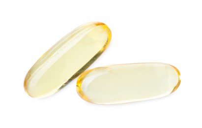 Photo of Collagen capsules isolated on white, top view