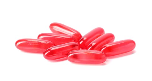 Photo of Collagen capsules isolated on white. Dietary supplement