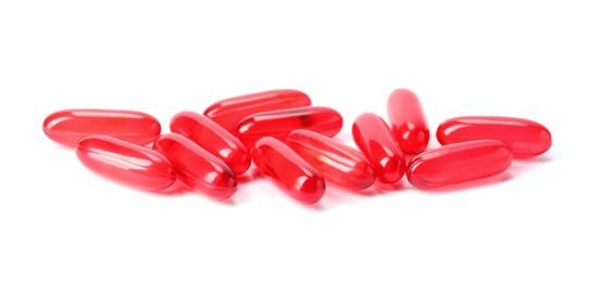 Photo of Collagen capsules isolated on white. Dietary supplement