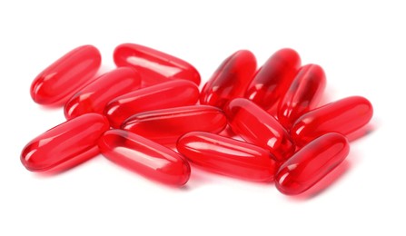 Photo of Collagen capsules isolated on white. Dietary supplement