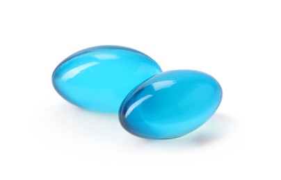 Photo of Collagen capsules isolated on white. Dietary supplement