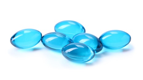 Photo of Collagen capsules isolated on white. Dietary supplement