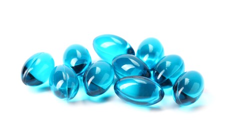 Photo of Collagen capsules isolated on white. Dietary supplement