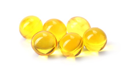 Photo of Collagen capsules isolated on white. Dietary supplement