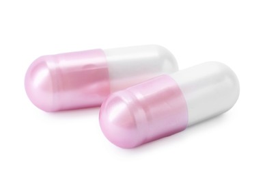 Photo of Collagen capsules isolated on white. Dietary supplement