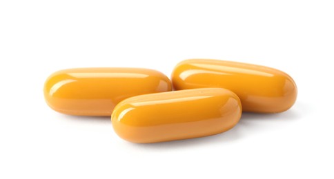 Photo of Collagen capsules isolated on white. Dietary supplement