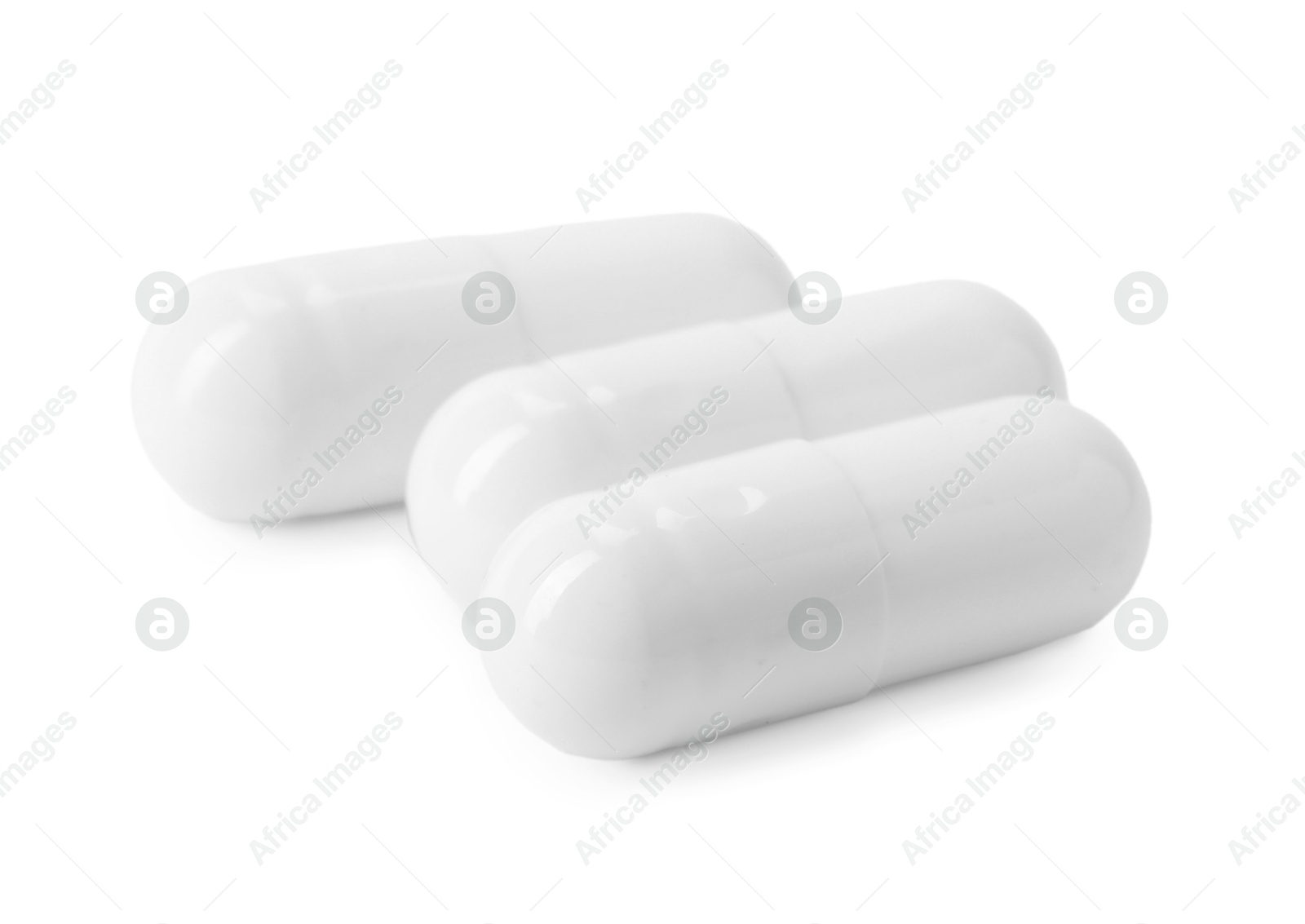 Collagen capsules isolated on white. Dietary supplement Photo of Collagen capsules isolated on white. Dietary supplement