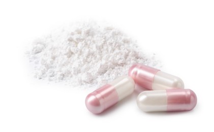 Photo of Collagen powder and pills isolated on white
