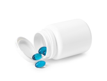 Photo of Collagen capsules in bottle isolated on white