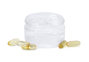 Photo of Jar of collagen gel and pills isolated on white
