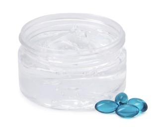 Photo of Jar of collagen gel and pills isolated on white